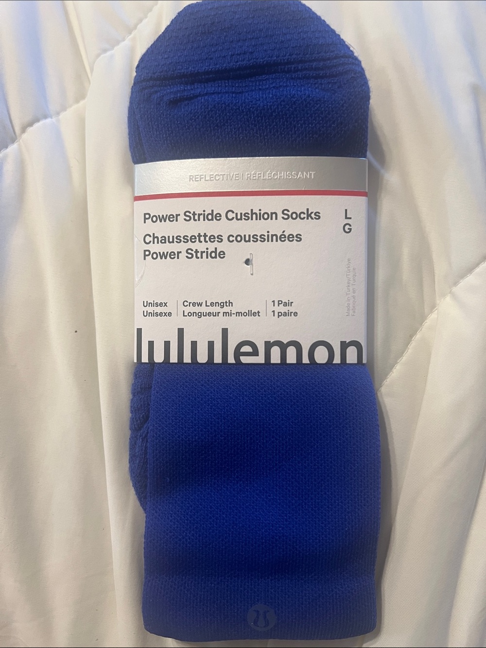 Power Stride Cushion Socks - reflective wordmark. Unisex